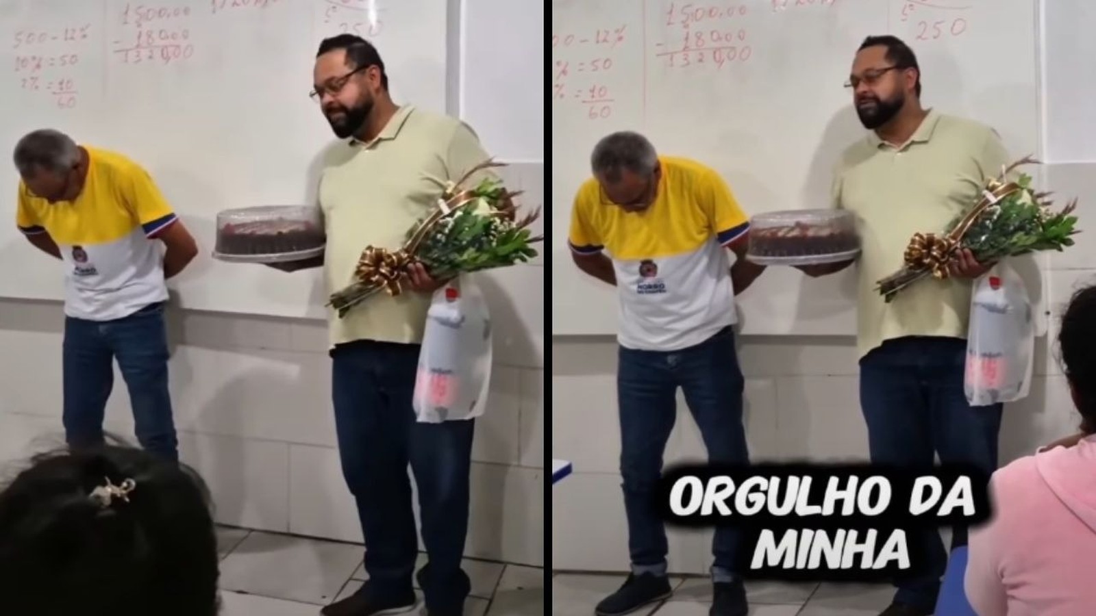 Dois homens em sala de aula, um curvado, outro com bolo e flores, texto ORGULHO DA MINHA