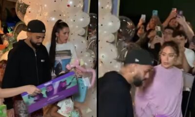 Imagem dividida de Gabigol e Rafaella Santos em festa, com balões e pessoas filmando.