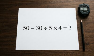 Expressão matemática 50 − 30 ÷ 5 × 4 = ? impressa em uma folha branca, ao lado de um lápis e um cronômetro marcando 15 segundos. - Imagem ilustrativa criada por inteligência artificial
