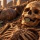 Arqueólogos encontram moeda em cima de túmulo de criança romana e sugerem que objeto seria a porta de entrada para o submundo
