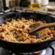 Desta vez, os chefs concordam: "Para a farofa de bacon ficar crocante, não coloque tudo na panela de uma vez, mas doure primeiro o bacon e acrescente a farinha aos poucos”