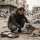Veterinário em Gaza arrisca a própria vida para continuar salvando cães e gatos abandonados em meio à guerra e emociona ao se recusar a deixar os animais sem ajuda