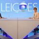 Lula e Renata Lo Prete em estúdio de TV, sentados em mesa, com a inscrição ELEICOES e logo Globo