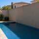 Muro erguido só para tapar o sol da piscina do vizinho é abuso de direito pelo Código Civil