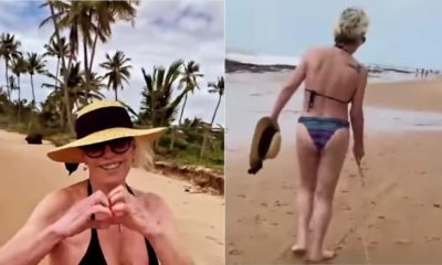 Ana Maria Braga caminhando na praia