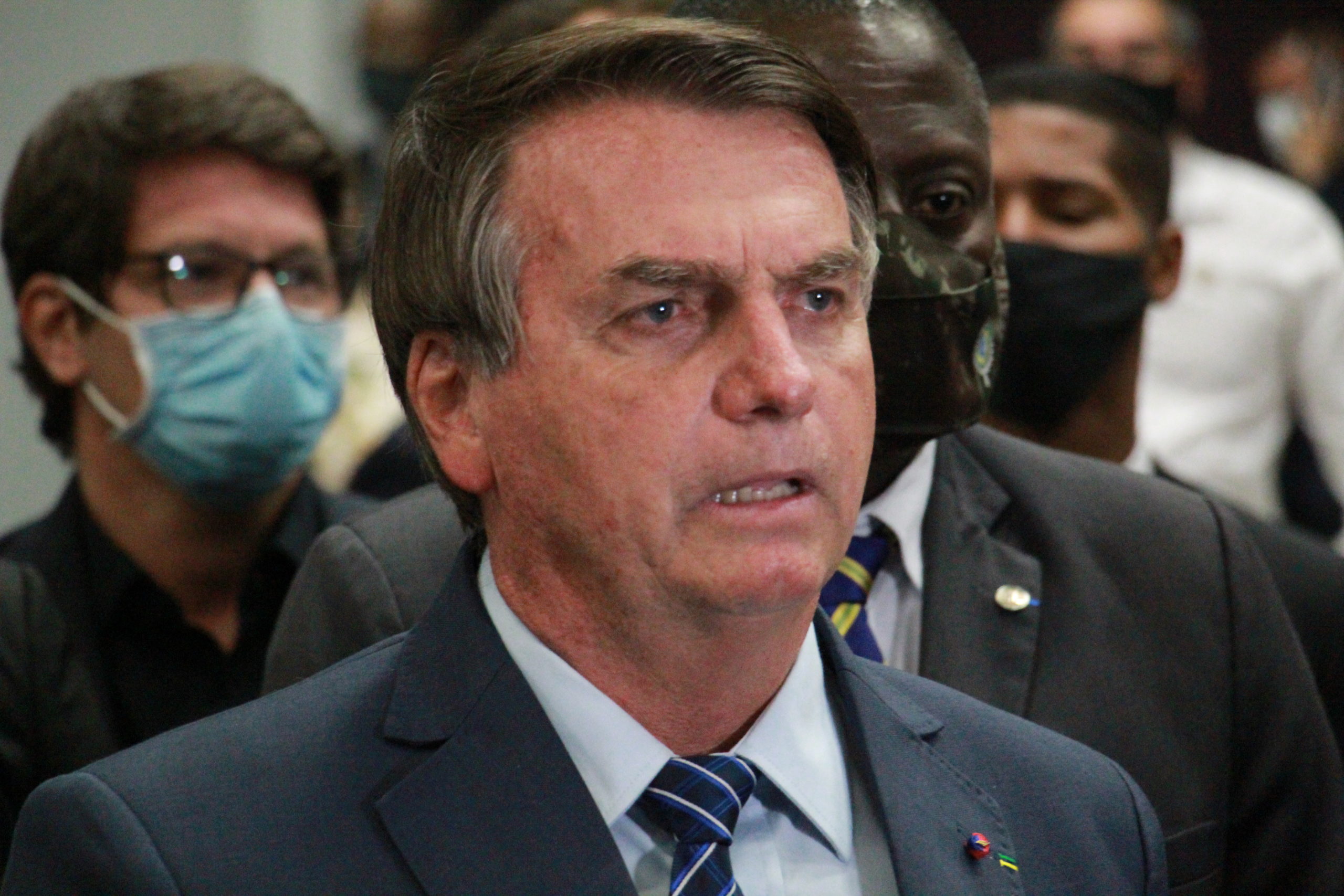 Presidente Jair Bolsonaro dando entrevista sobre o caso do motorista preso na Rússia