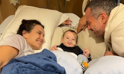 Malvino Salvador com a mulher, Kyra Gracie e o filho, Rayan, deitado na cama do hospital