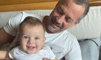 Malvino Salvador com o filho Rayan no colo