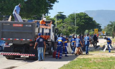 agentes trabalhando na via