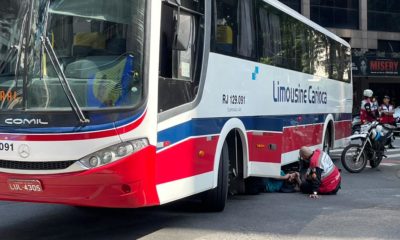 Vítima presa embaixo do ônibus após acidente