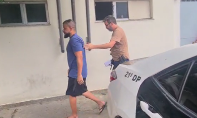 miliciano Emerson Moraes sendo conduzido à delegacia de Bonsucesso